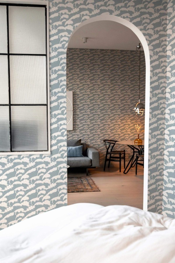 Modern scandinavian style living room decorated with Blue wave peel and stick wallpaper