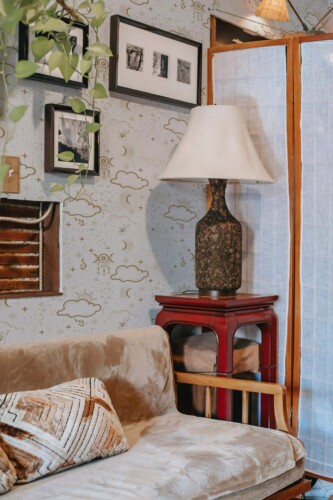 Southwestern style living room decorated with Boho astrology peel and stick wallpaper