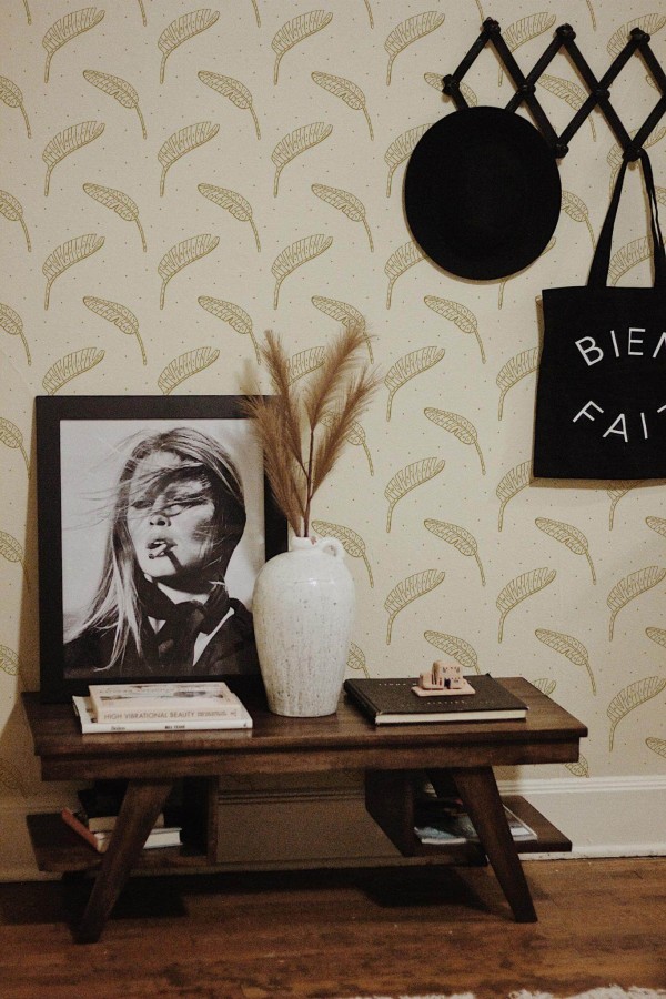 Rustic farmhouse style entryway decorated with Boho beige leaf peel and stick wallpaper