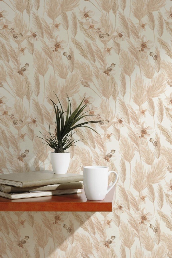 A soft, nature-inspired wall scene featuring the Fancy Walls “Boho Pampas Bloom” wallpaper, designed with a delicate botanical pattern of beige pampas grass, cream orchids, and subtle seed pods. The warm, earthy tones create a calming and elegant backdrop, ideal for minimalist or boho-chic interiors. Styled with a floating wooden shelf, stacked books, a white ceramic mug, and a small potted plant, the setting highlights the wallpaper’s gentle flow and natural elegance. Available as peel and stick or non-pasted wallpaper, this design is PVC-free and printed with GreenGuard Gold certified inks for vivid color and safe indoor air quality.