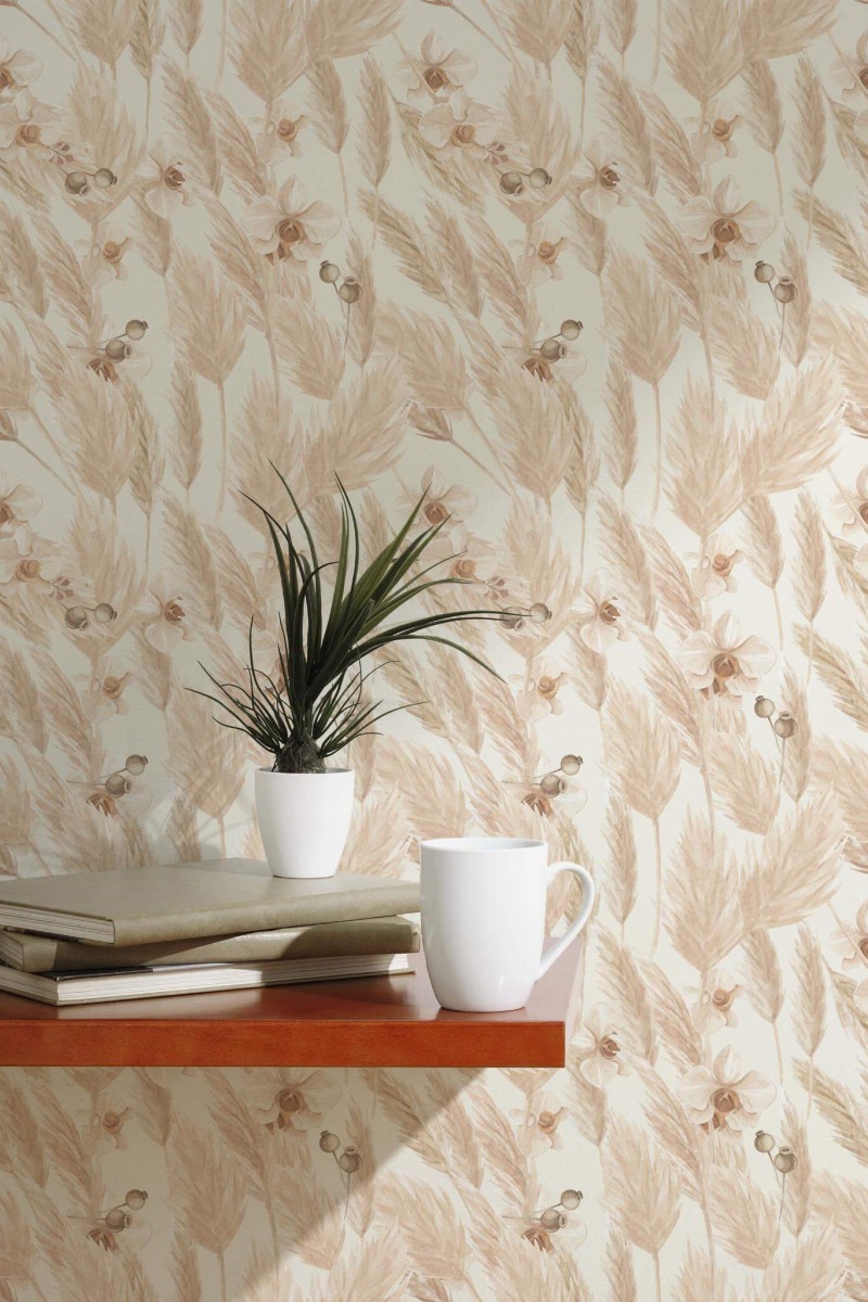 A soft, nature-inspired wall scene featuring the Fancy Walls “Boho Pampas Bloom” wallpaper, designed with a delicate botanical pattern of beige pampas grass, cream orchids, and subtle seed pods. The warm, earthy tones create a calming and elegant backdrop, ideal for minimalist or boho-chic interiors. Styled with a floating wooden shelf, stacked books, a white ceramic mug, and a small potted plant, the setting highlights the wallpaper’s gentle flow and natural elegance. Available as peel and stick or non-pasted wallpaper, this design is PVC-free and printed with GreenGuard Gold certified inks for vivid color and safe indoor air quality.