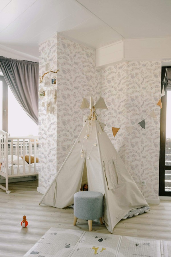 Boho style nursery decorated with Boho nursery peel and stick wallpaper