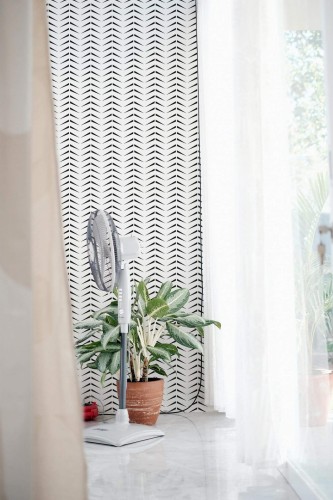 Minimal style living room decorated with Bold herringbone peel and stick wallpaper