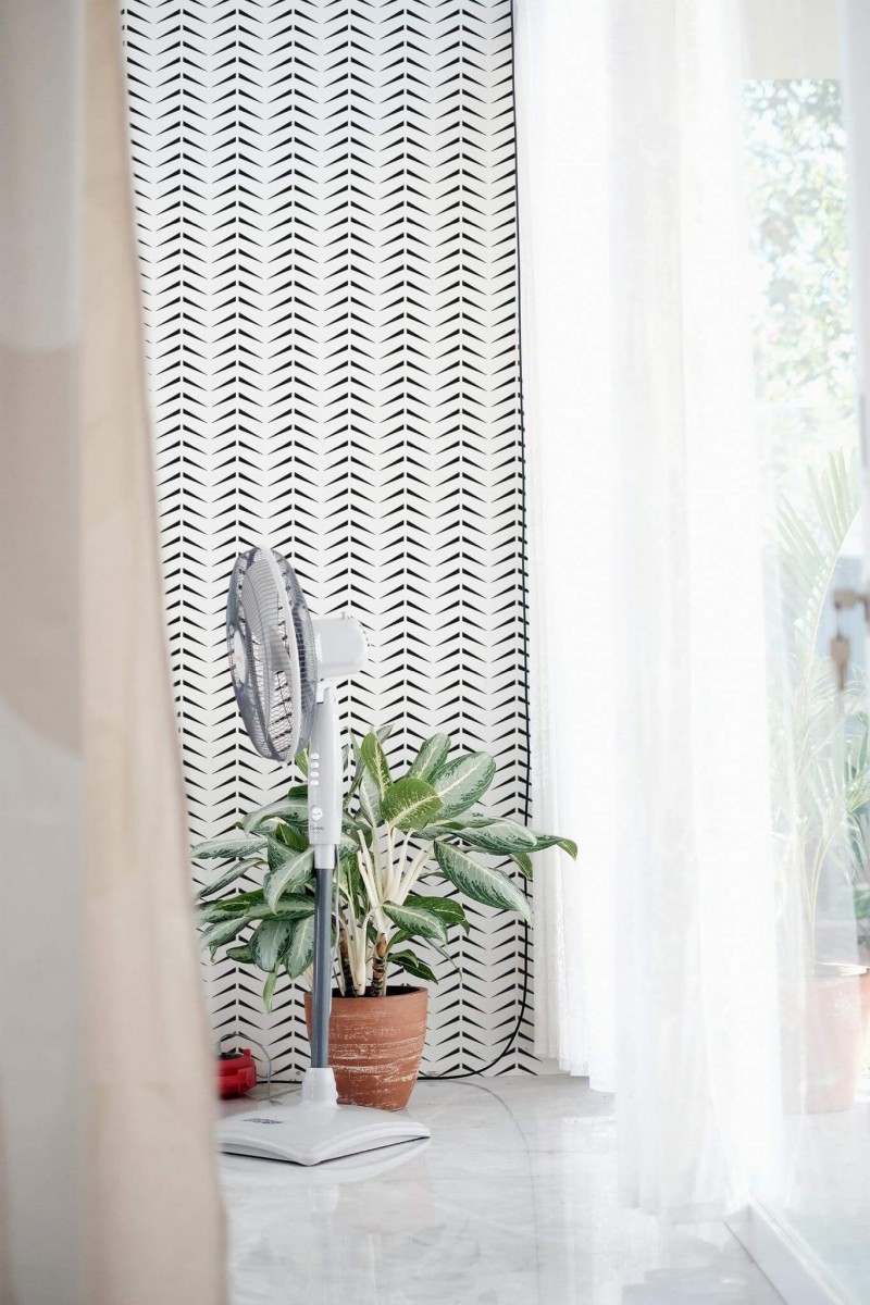 Minimal style living room decorated with Bold herringbone peel and stick wallpaper