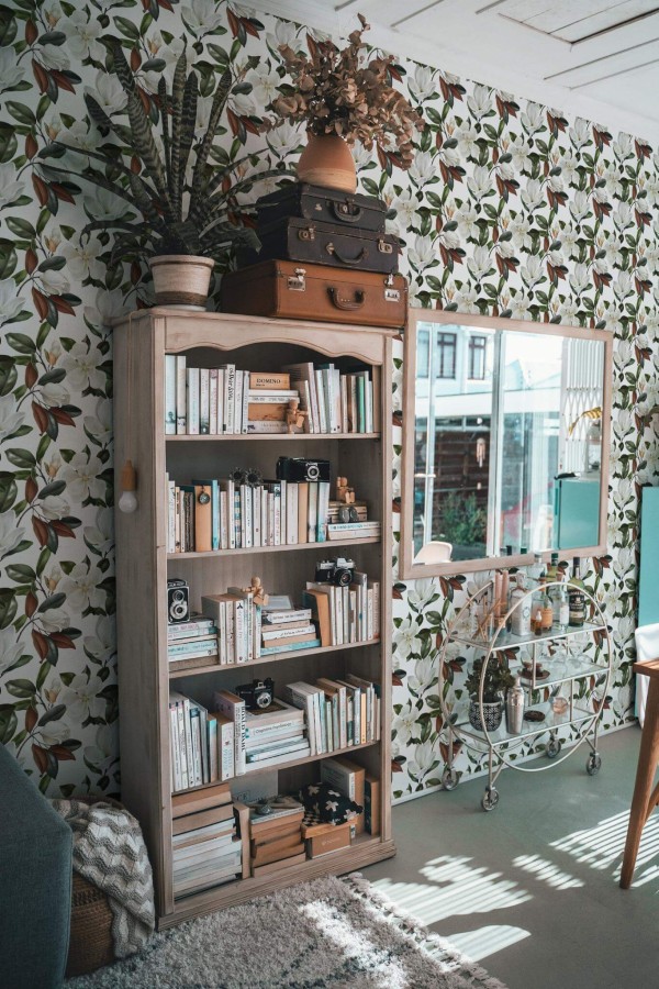 Farmhouse style living room decorated with Bold magnolia peel and stick wallpaper
