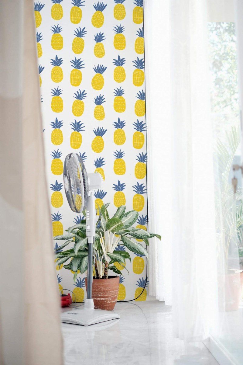 Minimal style living room decorated with Bold pineapple peel and stick wallpaper