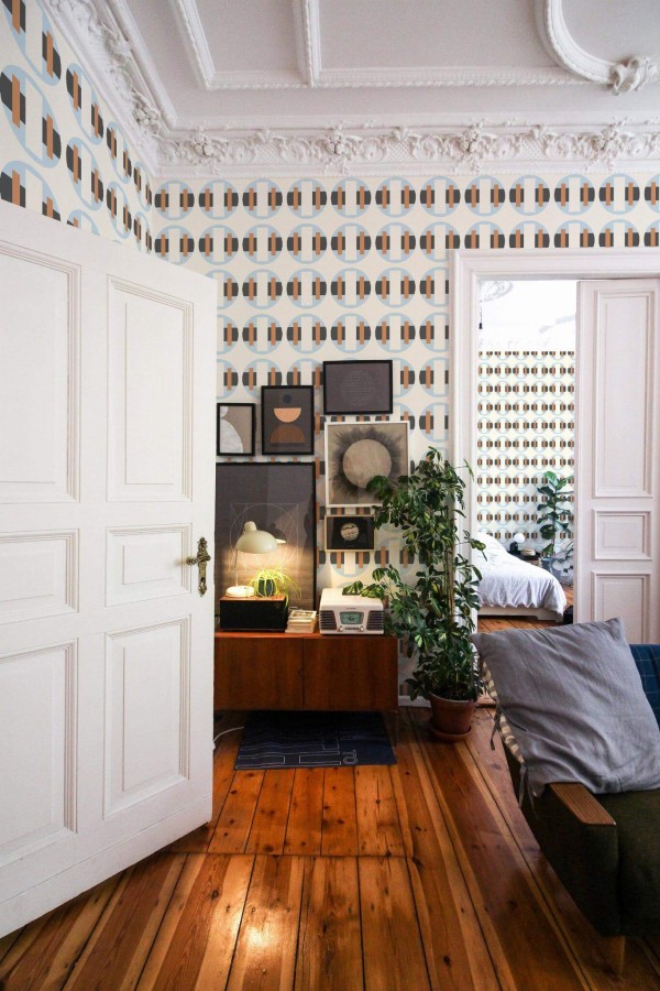 Mid-century modern luxury style living room and bedroom decorated with Bold retro circle peel and stick wallpaper