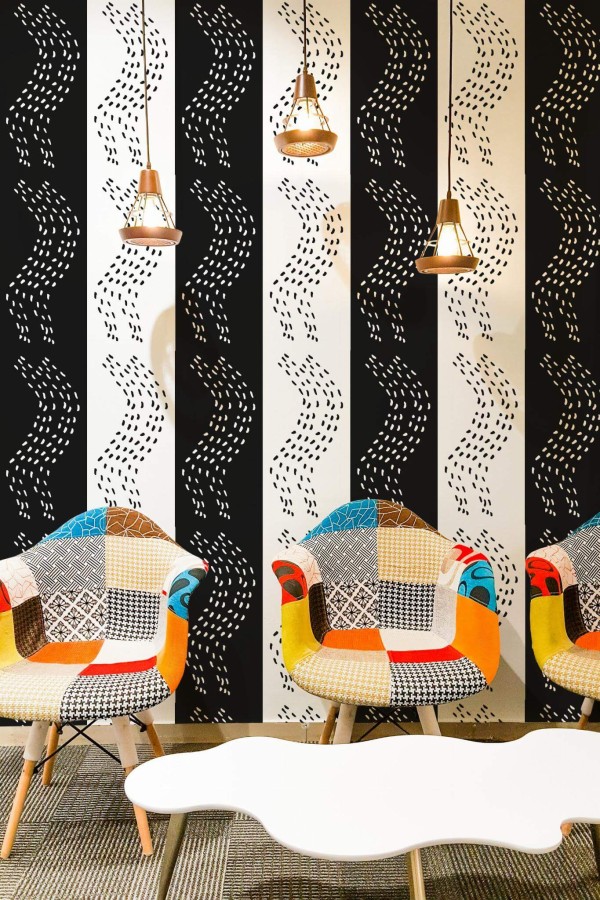 Mid-century modern style living room decorated with Bold scandi peel and stick wallpaper