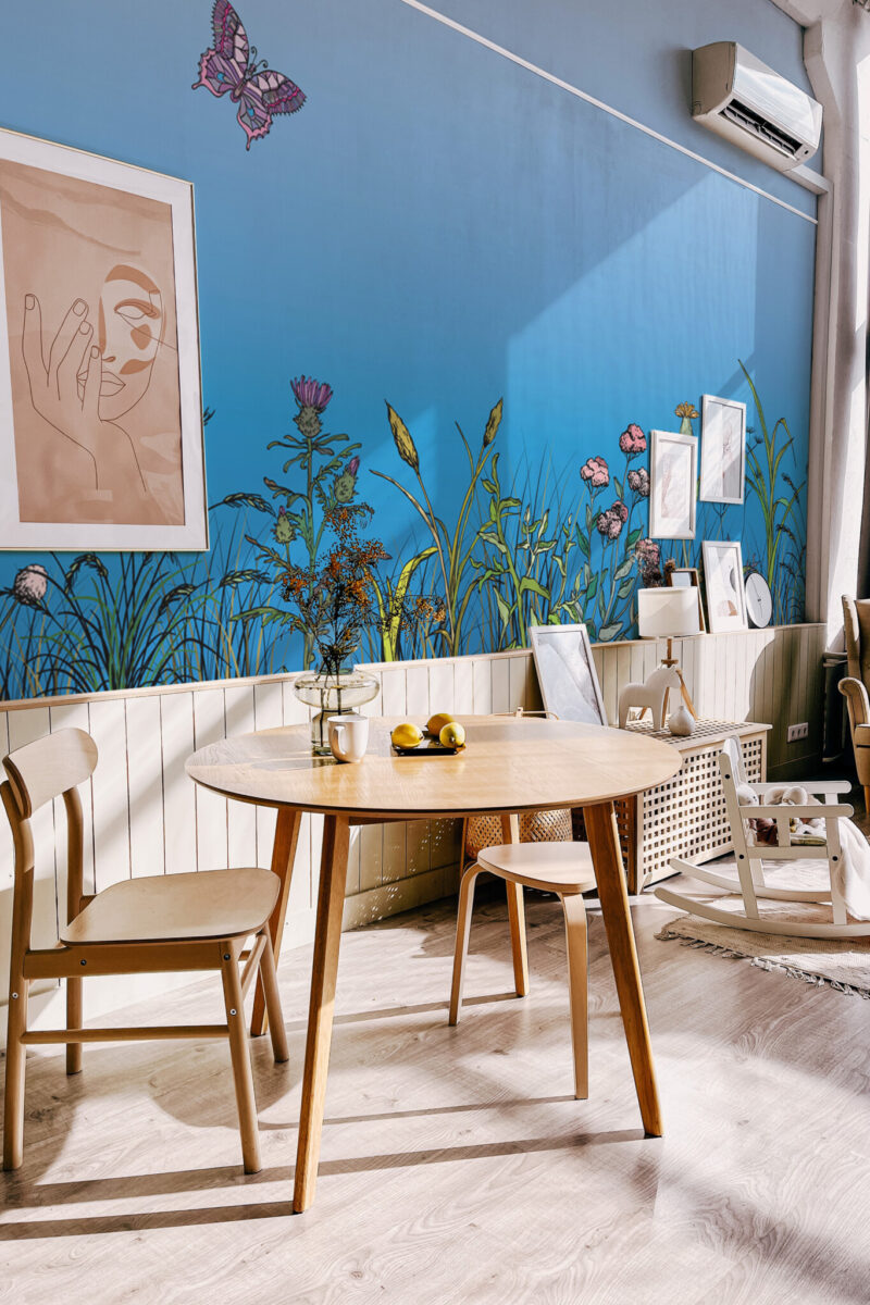 Wildflower Meadow Bliss Wall Mural with colorful wildflowers and butterflies on a blue gradient background, ideal for accent walls, bedrooms, or lively living spaces.