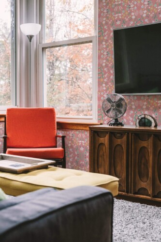 Rustic style living room decorated with Bramble garden peel and stick wallpaper
