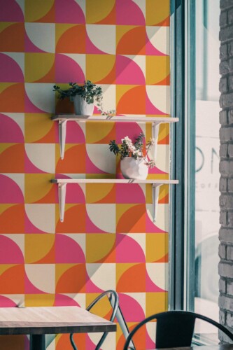 Industrial style cafe decorated with Bright curves peel and stick wallpaper