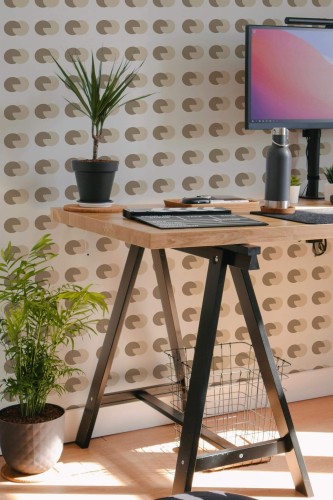 Scandinavian style home office decorated with Brown and beige circular peel and stick wallpaper