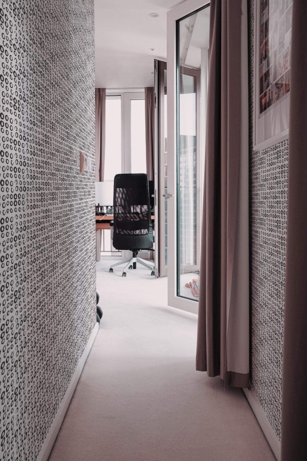 Modern scandinavian style hallway decorated with Brush stroke Circles peel and stick wallpaper