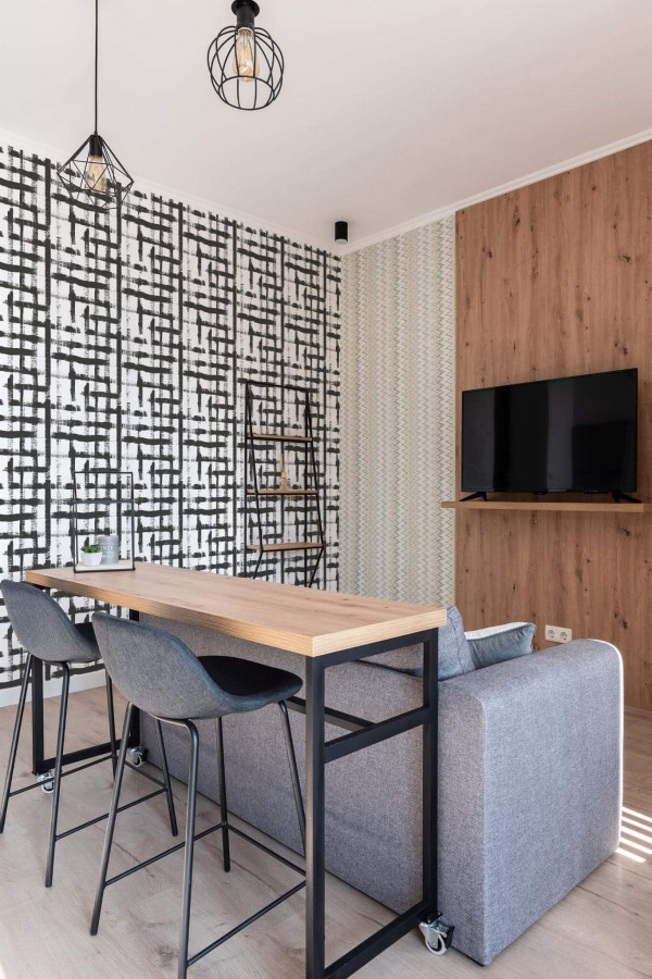 Scandinavian style open living room decorated with Brush stroke gingham peel and stick wallpaper