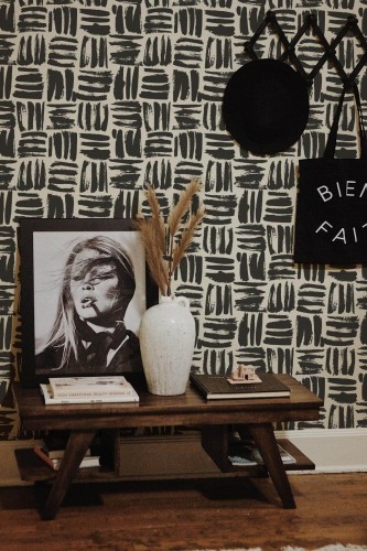 Rustic farmhouse style entryway decorated with Brush stroke squares peel and stick wallpaper