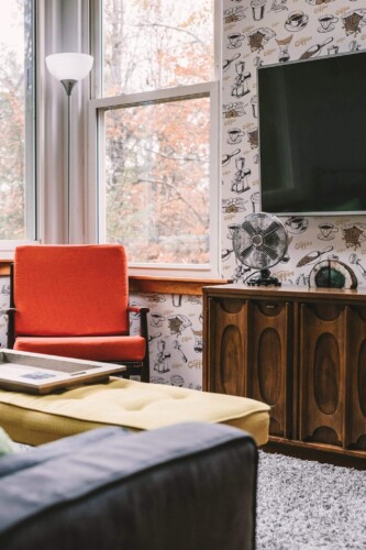 Rustic style living room decorated with Cafe peel and stick wallpaper