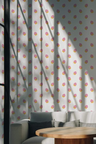 Whimsical cupcake wallpaper featuring a playful pattern of pink frosted cupcakes on golden yellow bases, arranged in a neat diagonal grid across a soft white background. The design creates a cheerful and inviting mood, ideal for cafés, bakeries, or modern dining corners. Shown in a sunlit lounge setting with a curved wood table and cream armchairs, this design adds lighthearted charm while remaining stylish and clean. The Fancy Walls peel and stick or non-pasted wallpaper makes installation easy and mess-free in both personal and commercial spaces.