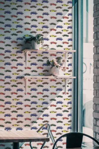 Industrial style cafe decorated with Car peel and stick wallpaper