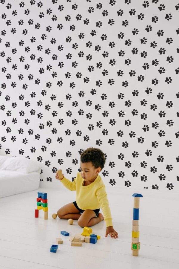 Minimal scandinavian style kids room decorated with Cat paws peel and stick wallpaper