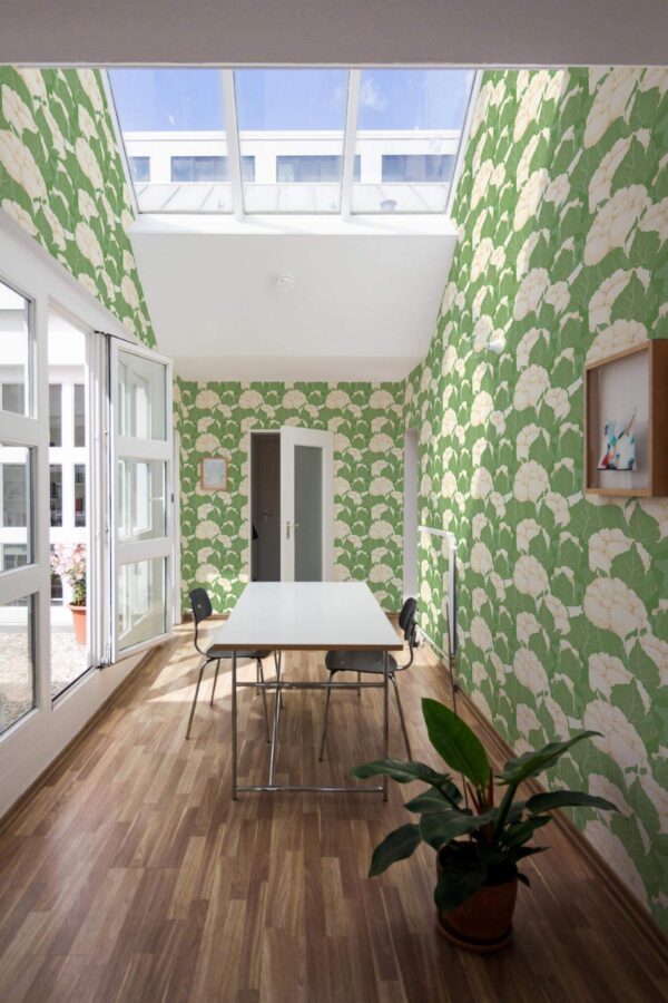 Minimal style dining room next to a balcony decorated with Cauliflower peel and stick wallpaper