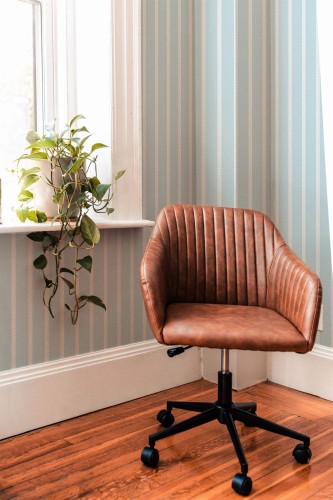 Mid-century modern style living room decorated with Chain striped pattern peel and stick wallpaper
