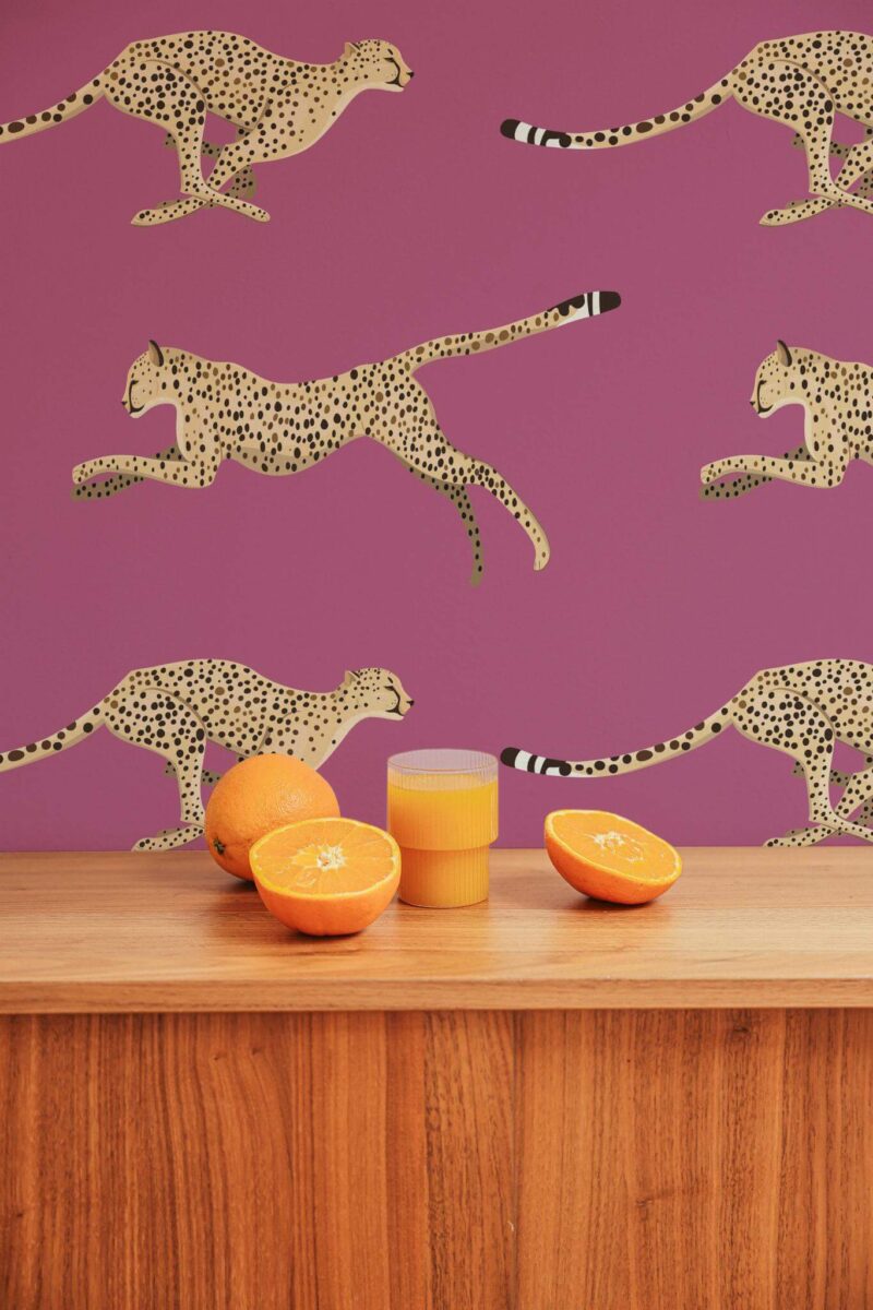 Mid-century style living room decorated with Cheetah peel and stick wallpaper