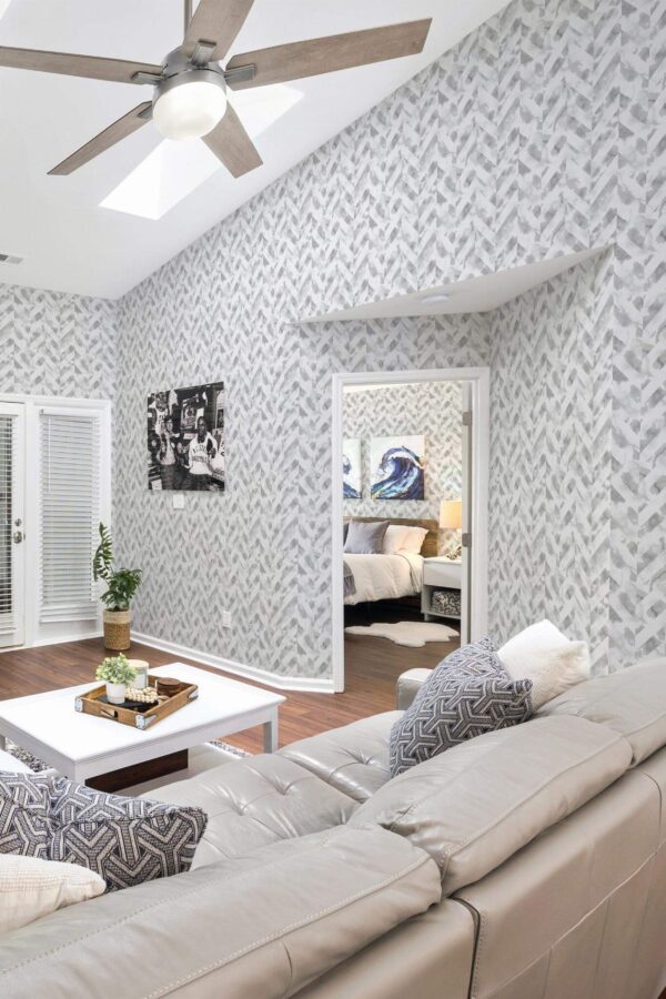 Coastal scandinavian style living room and bedroom decorated with Chevron stone peel and stick wallpaper