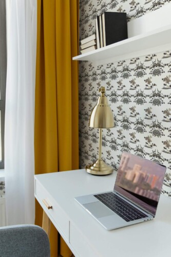 Scandinavian style home office decorated with Chinoiserie floral dragon peel and stick wallpaper
