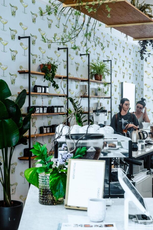 Industrial style bar decorated with Cocktails peel and stick wallpaper