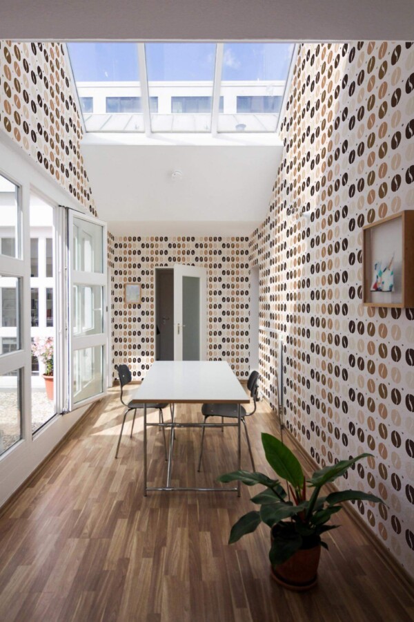 Minimal style dining room next to a balcony decorated with Coffee beans peel and stick wallpaper