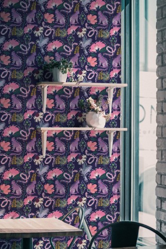 Industrial style cafe decorated with Colorful animal peel and stick wallpaper