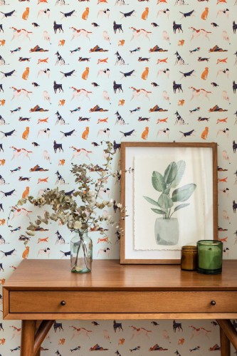 Mid-century modern style living room decorated with Colorful dog peel and stick wallpaper