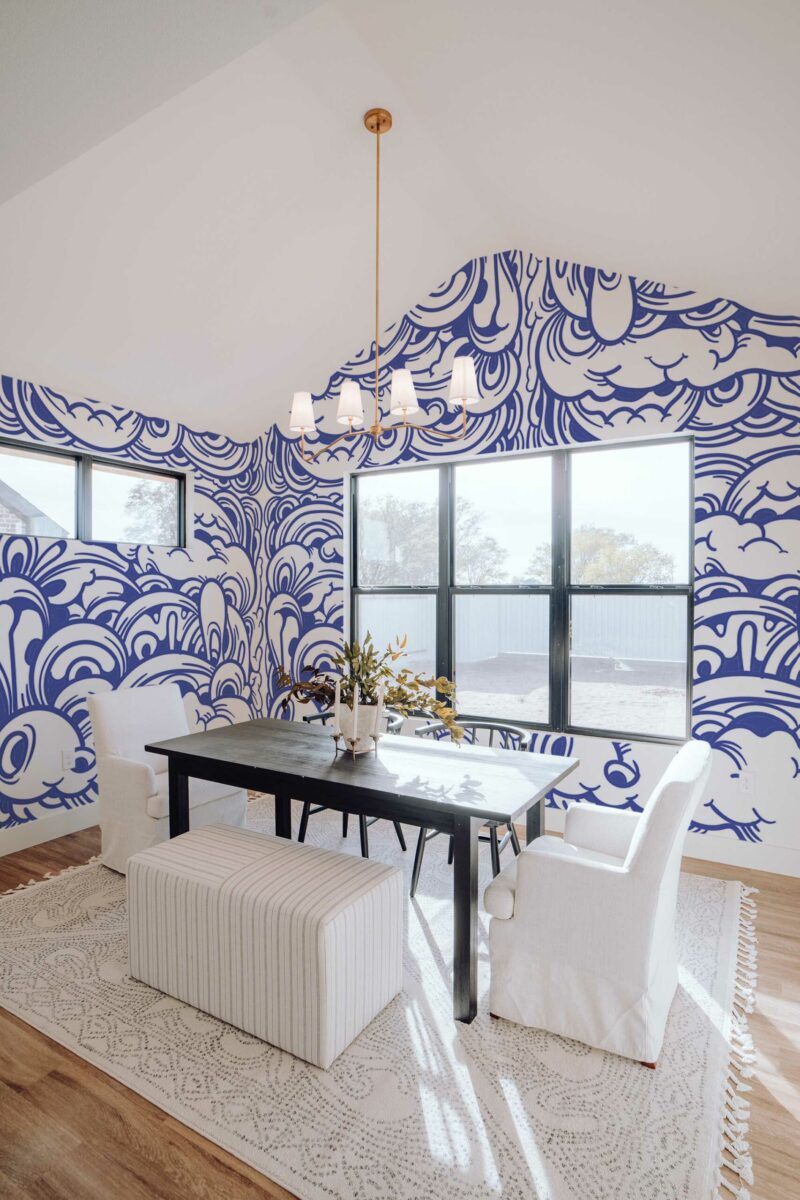 Whimsical Wave Doodle Wall Mural features a novelty style in bold blue and white, perfect for a playful accent wall. The dynamic wavy doodles add a sense of motion and creativity to any modern space. Use this fun wave wall mural to energize bedrooms, lounges, or artistic corners. Choose from a removable, self-adhesive version or go with the classic non-pasted style. The Whimsical Wave Doodle peel and stick wall mural uses GreenGuard Certified inks on eco-friendly, PVC-free materials. It suits smooth or lightly textured surfaces and installs easily without damage. This design adds character and lighthearted charm to any room.