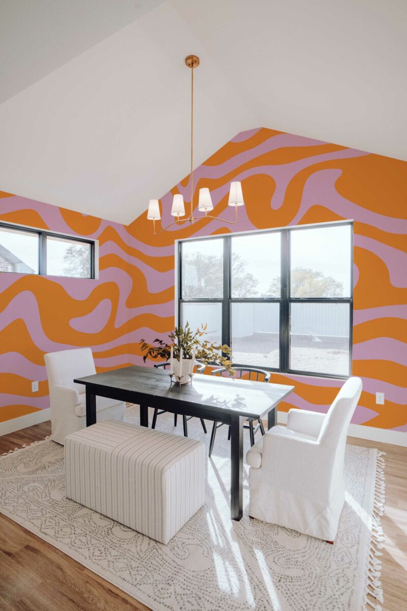 Pink Groovy Streak wall mural with orange and pink abstract funky fluid pattern, perfect for accent walls, salons, or playful interiors.