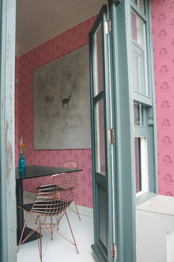 Minimal coastal style cafe decorated with Cupid peel and stick wallpaper