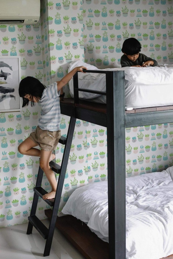 Minimalistic style kids room decorated with Cute plants peel and stick wallpaper