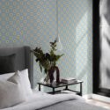 Scandinavian style bedroom decorated with Daisy polka dot peel and stick wallpaper