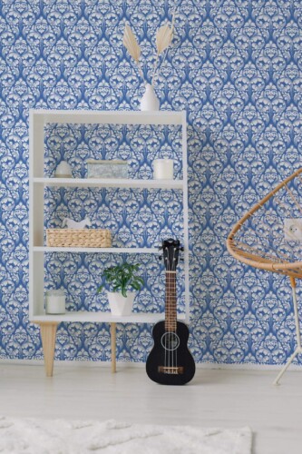 Minimal boho style living room decorated with Damask pattern peel and stick wallpaper