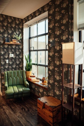 Mid-century style living room decorated with Dark floral peel and stick wallpaper