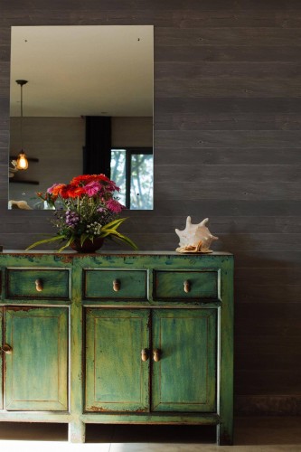 Industrial style living room decorated with Dark shiplap wood peel and stick wallpaper