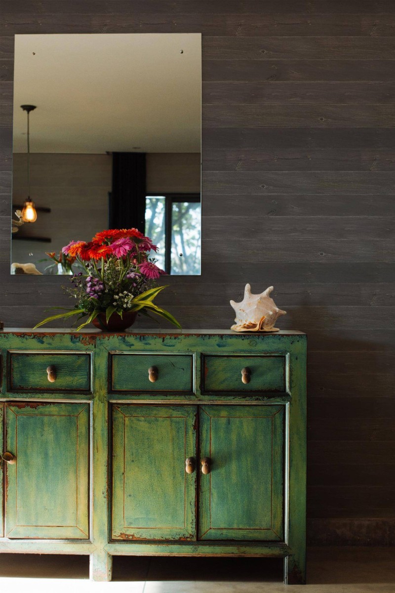 Industrial style living room decorated with Dark shiplap wood peel and stick wallpaper