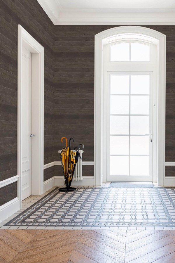 Minimal farmhouse style entryway decorated with Dark shiplap wood peel and stick wallpaper