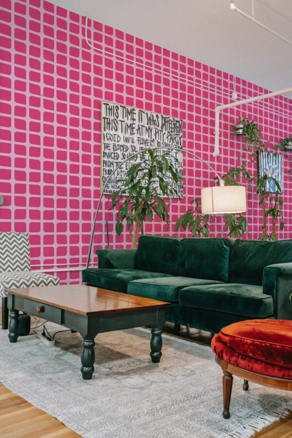 Bold eclectic style living room decorated with Doll House Inspired Geometric peel and stick wallpaper and emerald green sofa