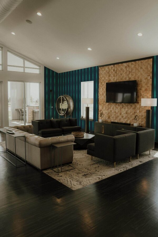 Hollywood glam style living room decorated with Elegant teal herringbone peel and stick wallpaper