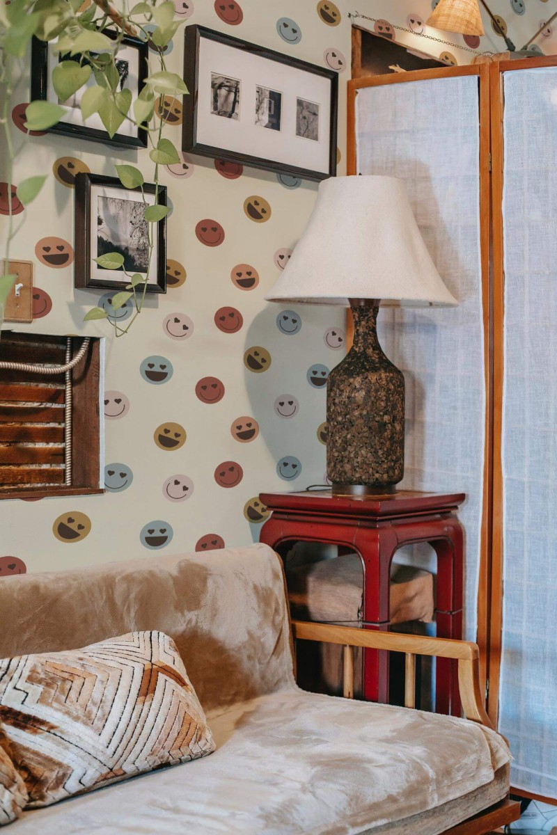 This wallpaper features a playful design of colorful emojis, each with different expressions, set against a soft, neutral background. The vibrant yet subtle colors and fun pattern create a lively, joyful atmosphere. This emoji wallpaper fits perfectly in a kids' room or a fun, creative space, bringing personality and warmth to any wall. The Fancy Walls peel and stick or non-pasted wallpaper is made with eco-friendly materials and printed using GreenGuard Gold certified inks for vibrant color and safe indoor air quality.