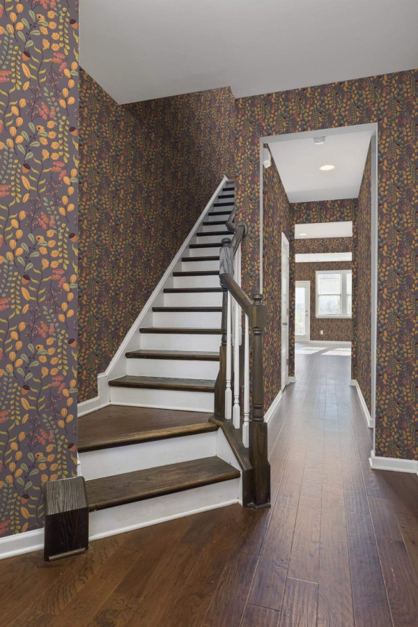 Rustic style hallway decorated with Fall peel and stick wallpaper