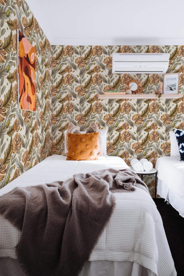 Boho style bedroom decorated with Feather boho peel and stick wallpaper