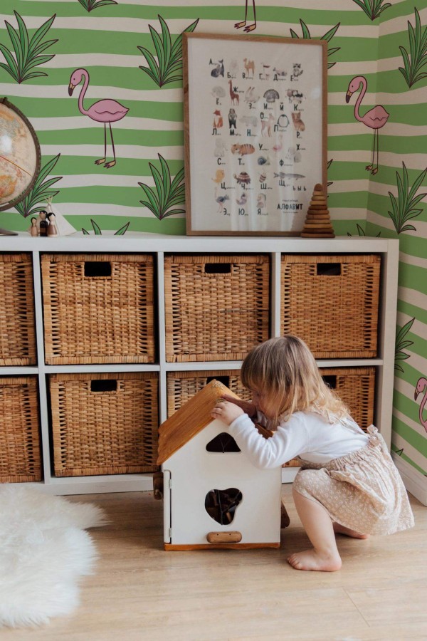 Boho gender neutral style kids room decorated with Flamingo striped peel and stick wallpaper