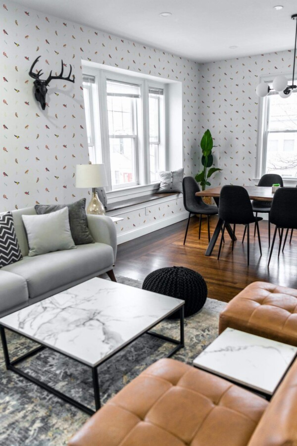Mid-century modern scandinavian style living dining room decorated with Forest birds peel and stick wallpaper
