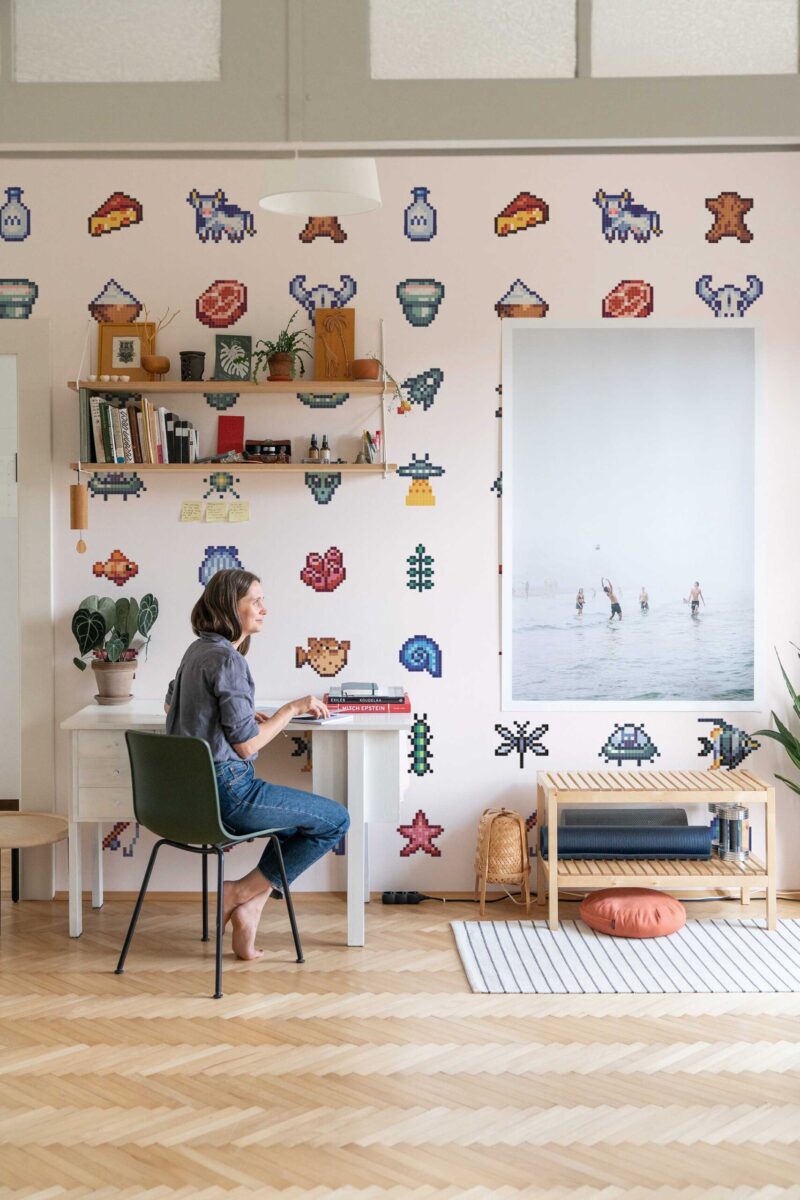 Cute Pixels Game Room Wall Mural with colorful pixel art elements on a light pink background, ideal for game rooms, kids’ playrooms, or creative studios.